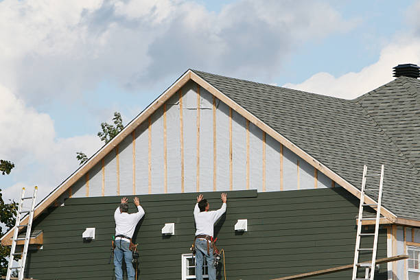 Professional Siding technician working in East Hampton, CT
